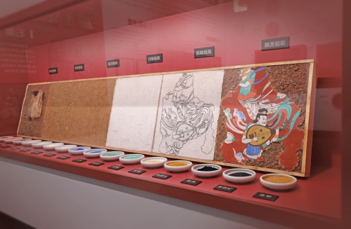 讲述“东方微笑”守护之路 麦积山石窟保护历程展启幕